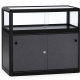 Compacte zwarte toonbankvitrine voor het presenteren van kleine producten en demonstraties.